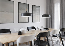 Load image into Gallery viewer, Dining Room with 3 storm artwork hanging on a wall behind the table.