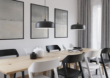 Load image into Gallery viewer, Dining Room with 3 storm artwork hanging on a wall behind the table.
