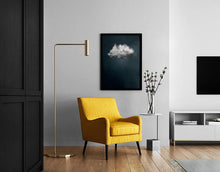 Load image into Gallery viewer, Yellow armchair in living room with a Dark petrol blue coloured art print featuring a single white and grey storm cloud.
